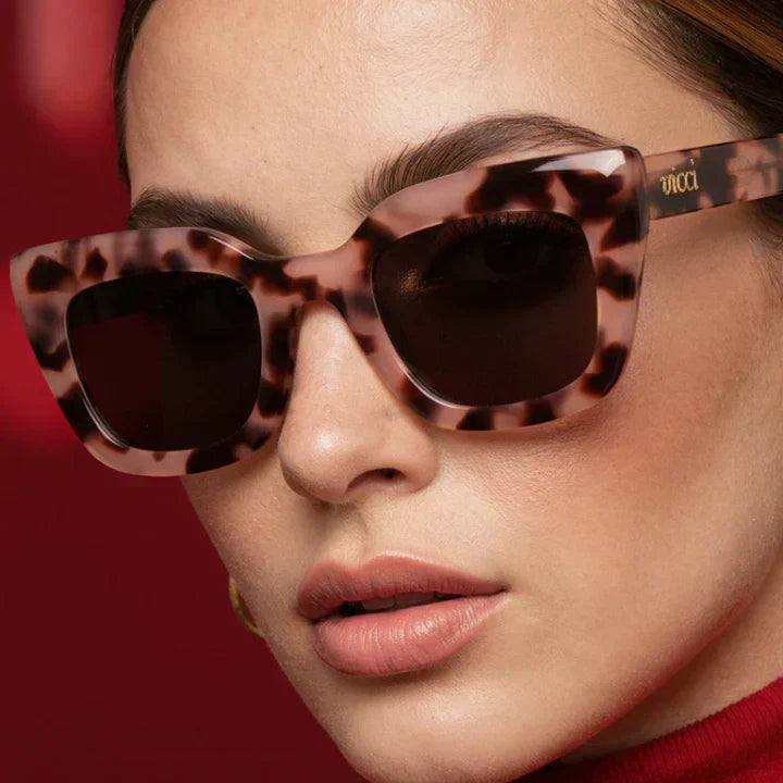 Woman wearing FSA eligible prescription sunglasses from Vicci Eyewear